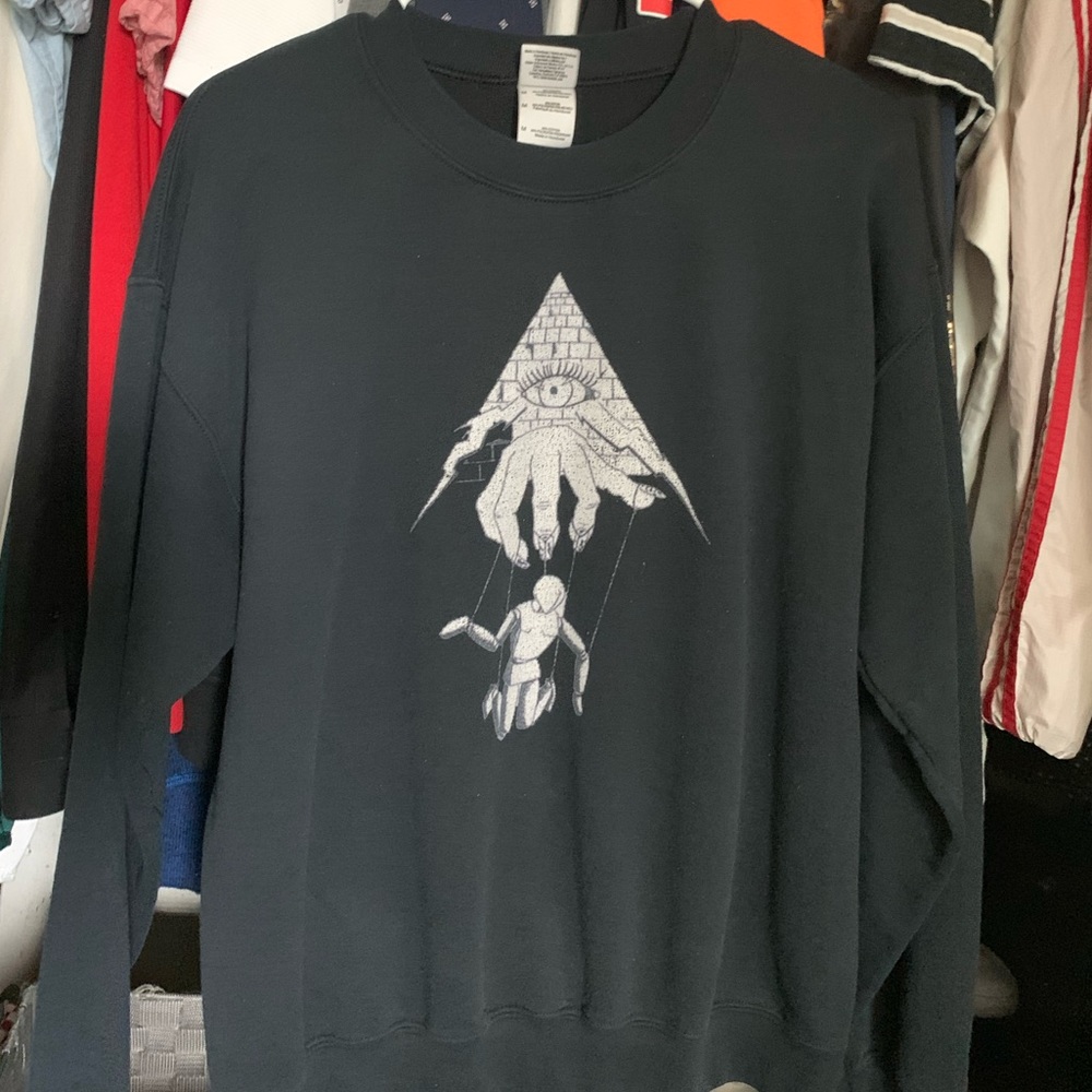Black long sleeve tee with puppet design